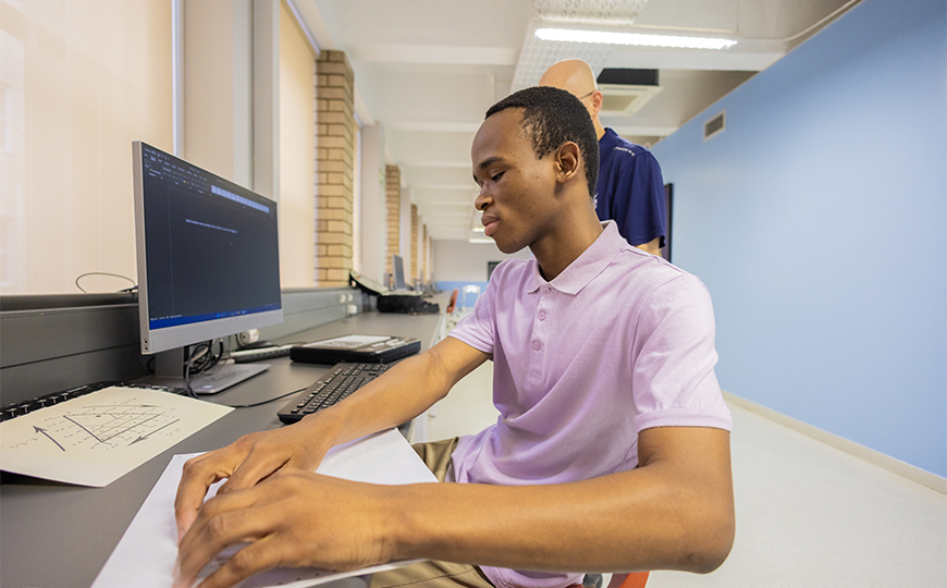 Top achieving special needs student Kabelo Kekana receives assisted at the DRU